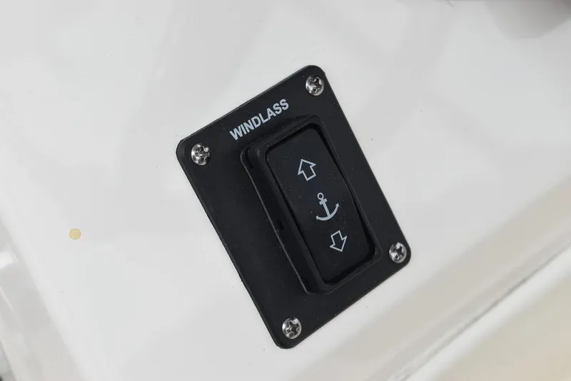 Slide: The Image of Windlass control switch on 2025 Key West 239 FS boat dashboard. - 36