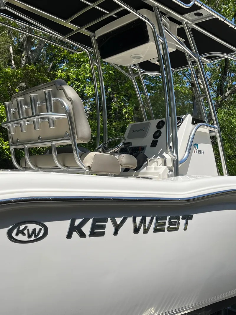 Slide: The Image of 2021 Key West 219 FS boat with sleek design and modern console. - 15