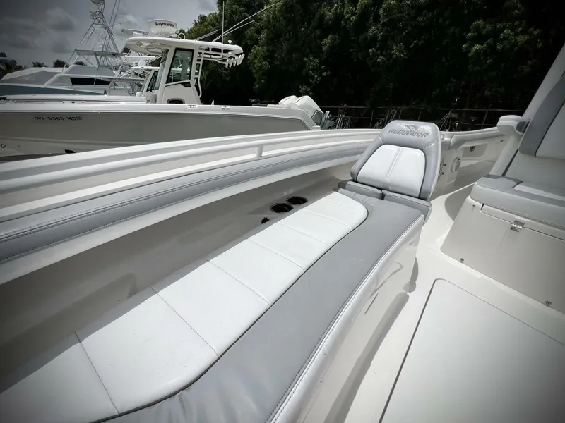 Slide: The Image of 2020 Regulator 23 boat interior with sleek seating and modern design. - 22