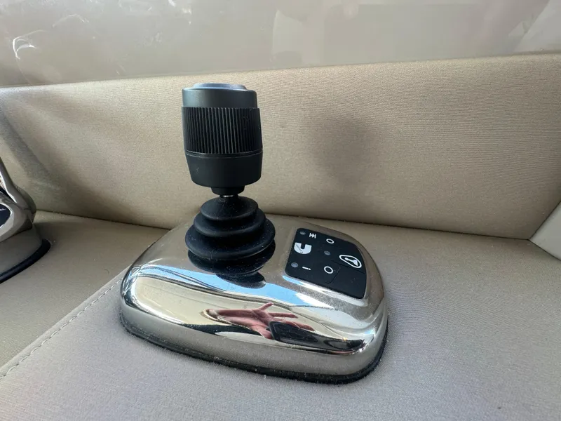 Slide: The Image of Joystick control on 2017 Sea Ray Sundancer boat, featuring sleek design and intuitive interface. - 44