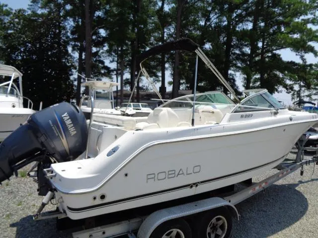 Slide: The Image of 2009 Robalo R227 Dual Console boat on trailer with Yamaha outboard motor. - 10
