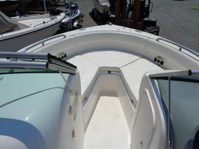 Slide: The Image of 2009 Robalo R227 Dual Console boat bow seating area. - 16