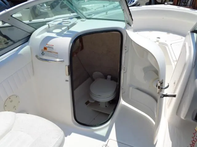 Slide: The Image of 2009 Robalo R227 Dual Console boat with onboard toilet. - 18