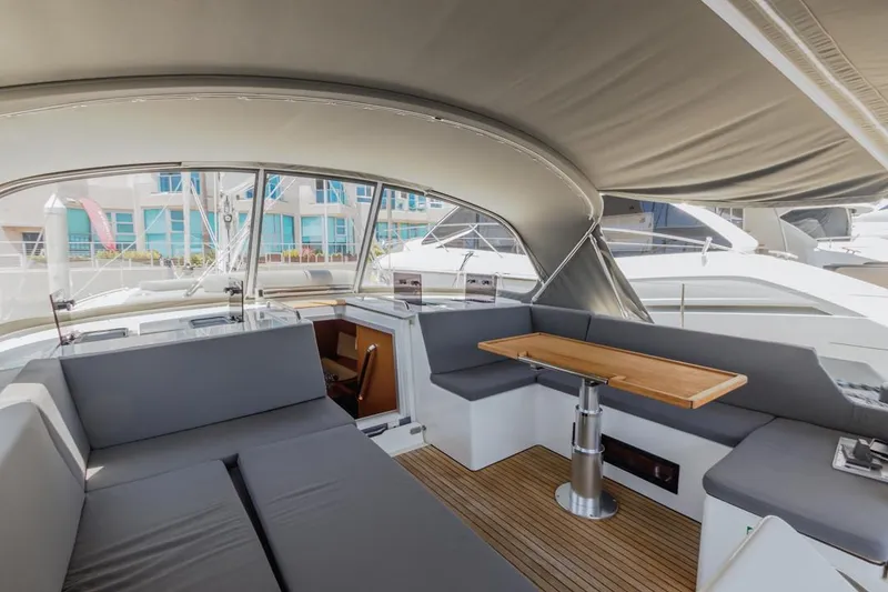 Slide: The Image of Luxurious 2022 Bavaria C50 yacht interior with sleek seating and elegant design. - 14
