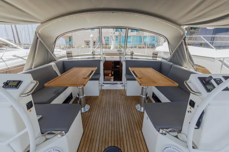 Slide: The Image of Spacious interior of 2022 Bavaria C50 yacht with wooden flooring and seating area. - 24