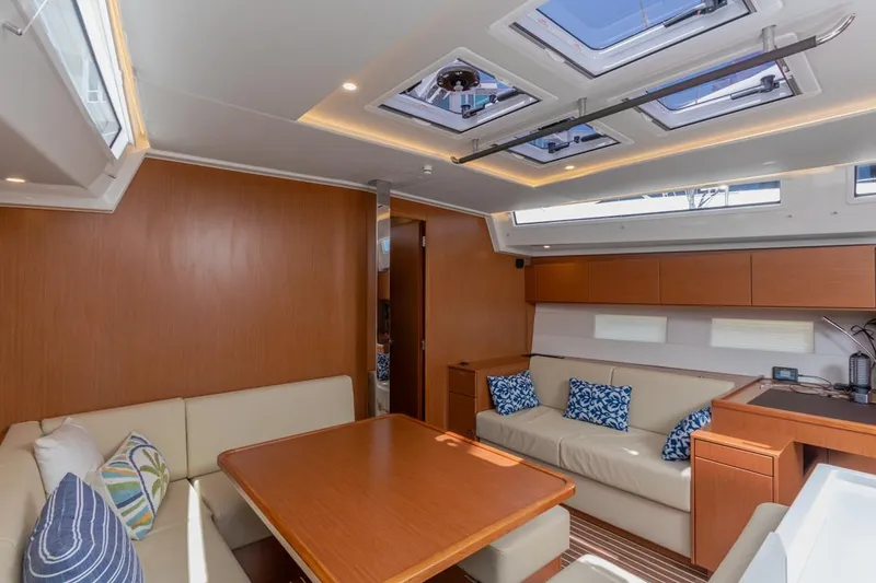 Slide: The Image of Luxurious interior of 2022 Bavaria C50 yacht with modern seating and skylights. - 36