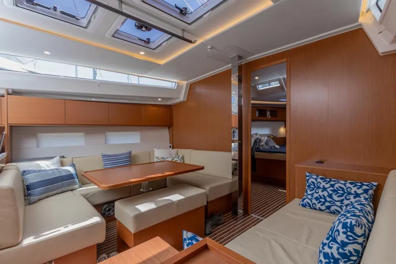 Slide: The Image of Luxurious interior of 2022 Bavaria C50 yacht with modern seating and skylights. - 37