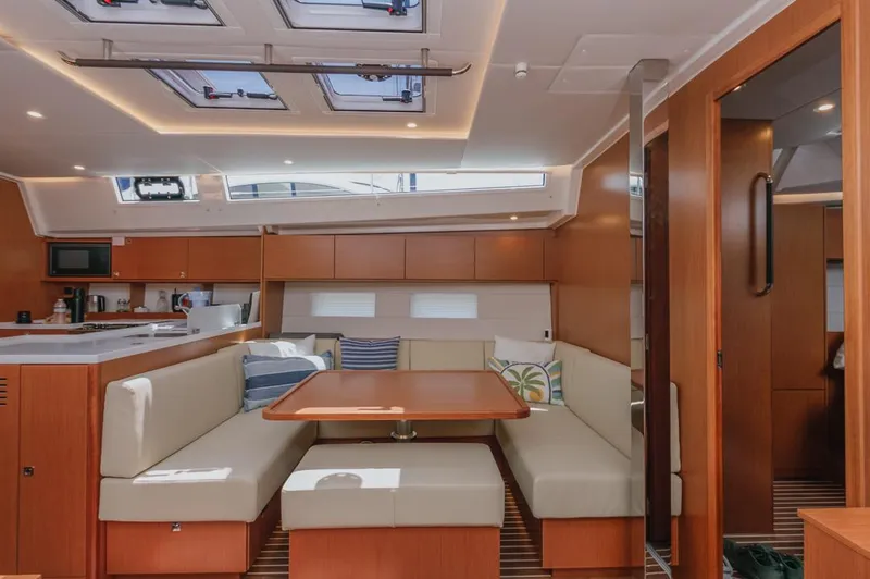 Slide: The Image of Interior of 2022 Bavaria C50 yacht with modern dining area and skylights. - 43