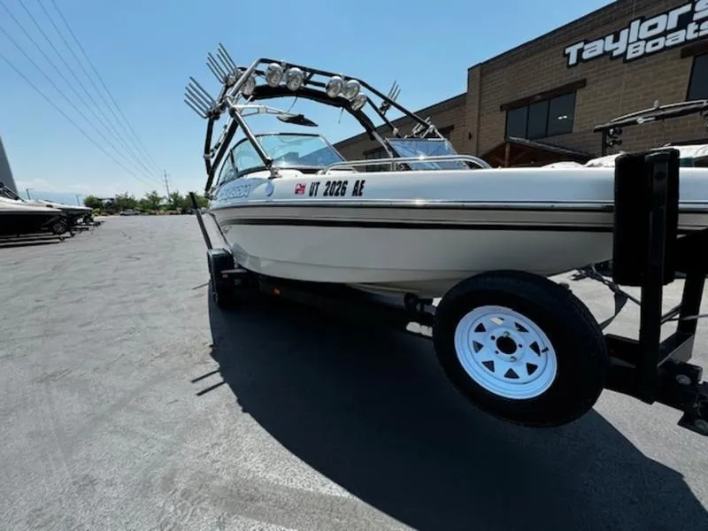 Slide: The Image of 2004 Calabria PRO-V boat on trailer at Taylor's Boats dealership. - 3