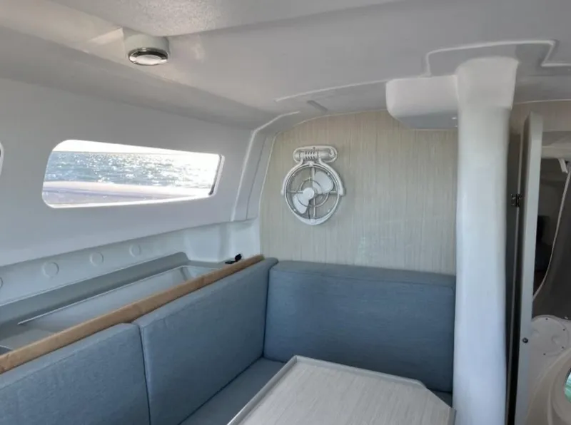 Slide: The Image of Interior of Corsair 880 Standard 2024 with gray seating. - 11