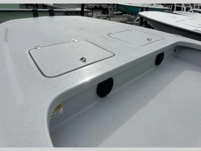Slide: The Image of 2024 Majek Boats 24 REAPER deck with storage compartments. - 5