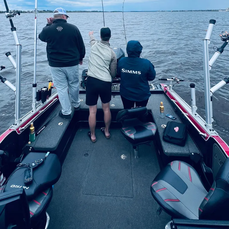 Slide: The Image of Three people fishing on a 2021 Nitro ZV20 Pro boat. - 3