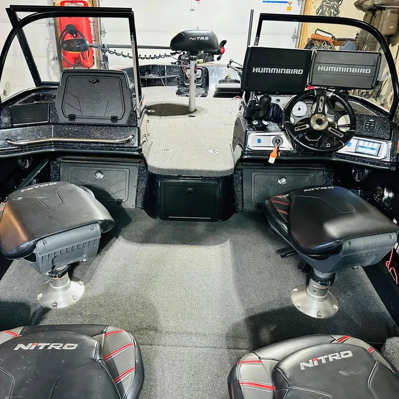 Slide: The Image of Interior of a 2021 Nitro ZV20 Pro boat with dual Humminbird displays. - 4