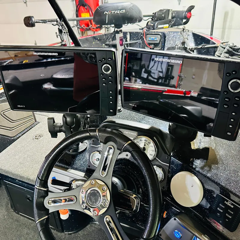 Slide: The Image of Nitro ZV20 Pro 2021 boat dashboard with dual Humminbird Helix fish finders. - 5