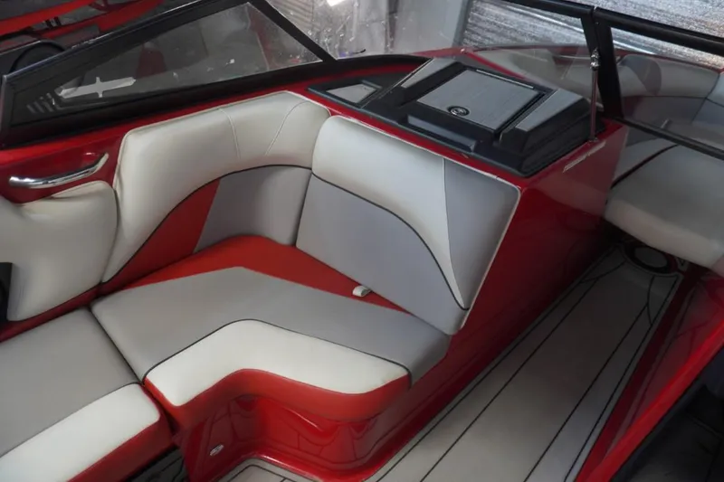 Slide: The Image of 2019 Moomba Craz MG boat interior with red and white seating. - 12