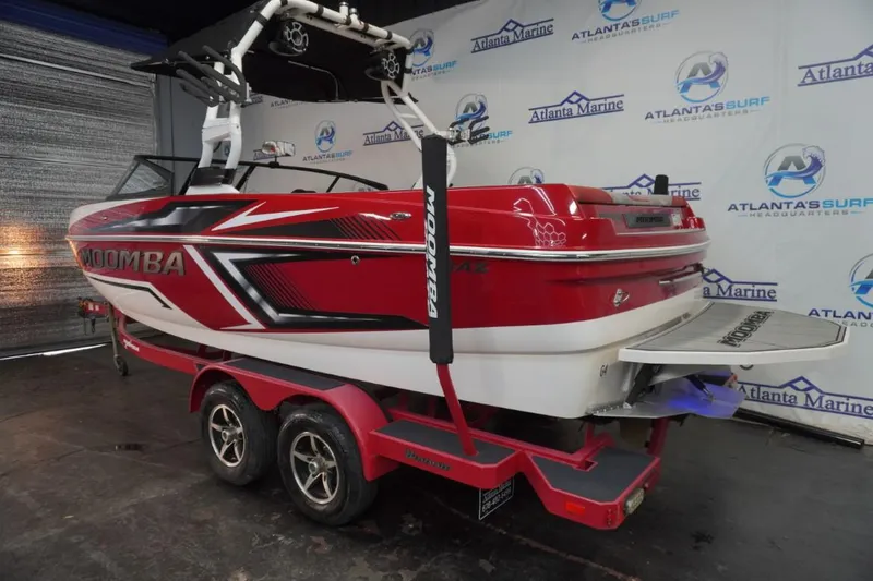 Slide: The Image of 2019 Moomba Craz MG boat in red and white, displayed at Atlanta Marine. - 3