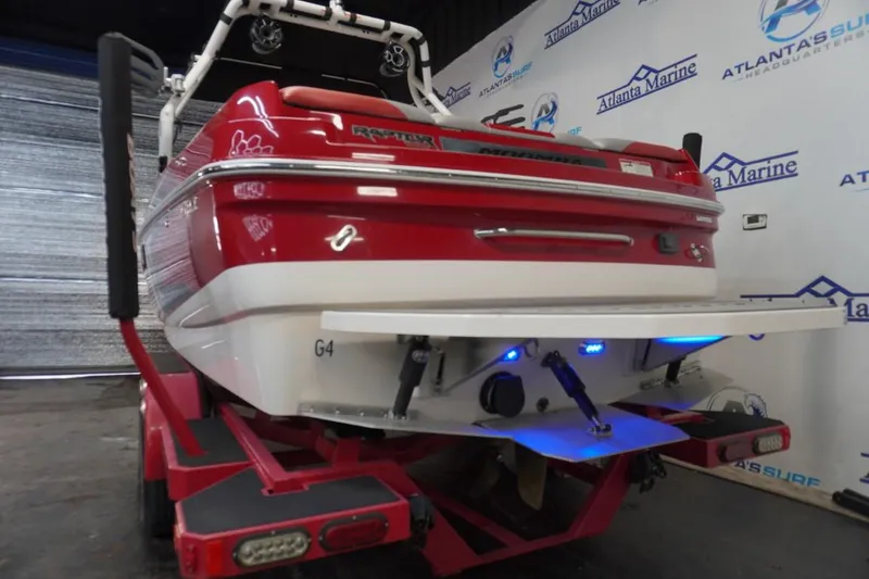 Slide: The Image of 2019 Moomba Craz MG boat, red and white, displayed at Atlanta Marine. - 4