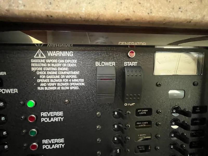 Slide: The Image of Control panel of a 2006 Rinker Fiesta Vee 342 boat with safety warnings. - 20