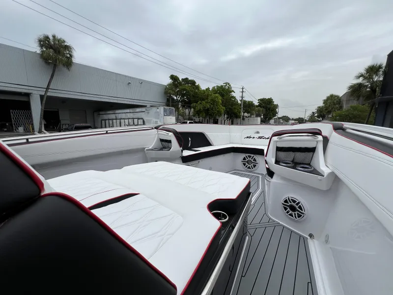 Slide: The Image of 2025 Nor-Tech 400 Supersport boat interior with sleek seating and modern design. - 24