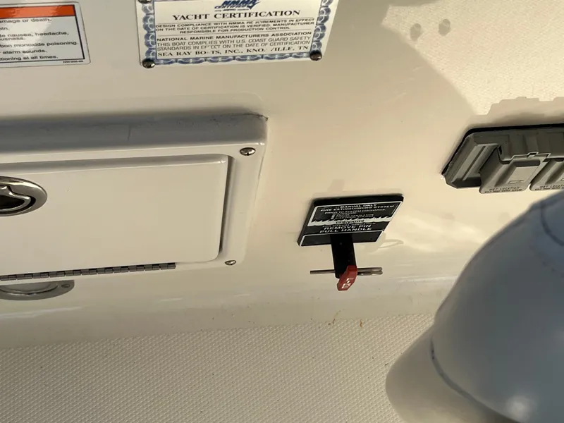 Slide: The Image of Control panel of 2007 Sea Ray 270 Amberjack boat with yacht certification label. - 13