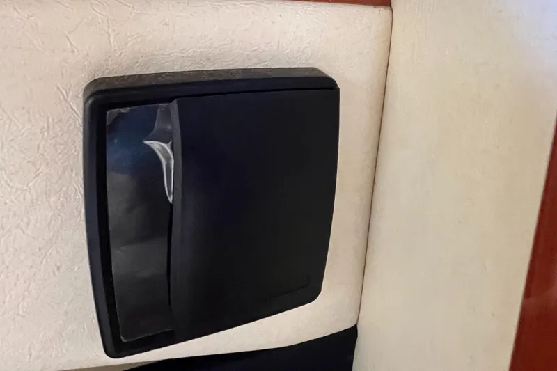 Slide: The Image of Black compartment on 2007 Sea Ray 270 Amberjack interior wall. - 17
