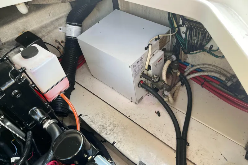 Slide: The Image of Engine compartment of 2007 Sea Ray 270 Amberjack with wiring and components. - 30