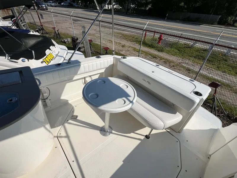 Slide: The Image of 2007 Sea Ray 270 Amberjack boat deck with seating and table. - 6