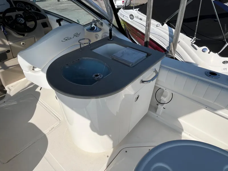 Slide: The Image of 2007 Sea Ray 270 Amberjack boat interior with sink and counter. - 7