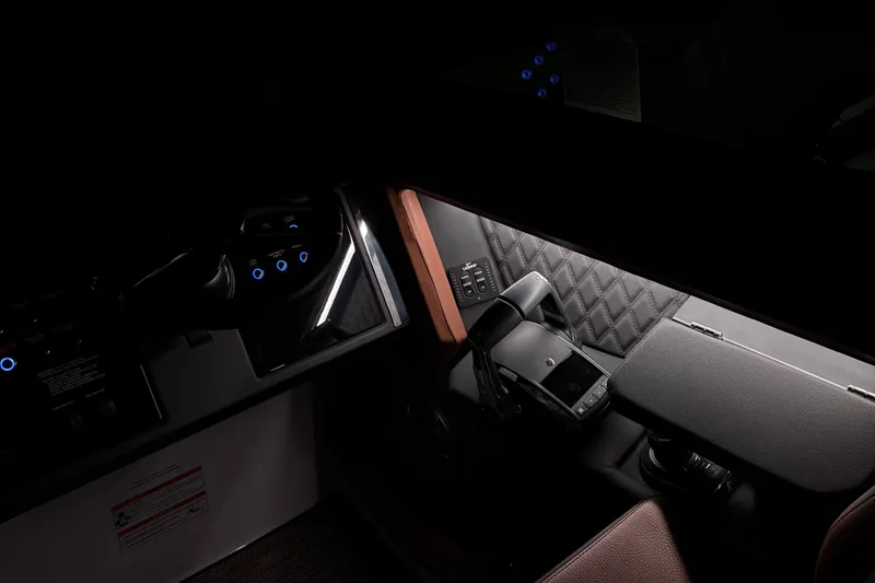 Slide: The Image of 2024 Cobalt R33 cockpit with illuminated controls and quilted paneling. - 20