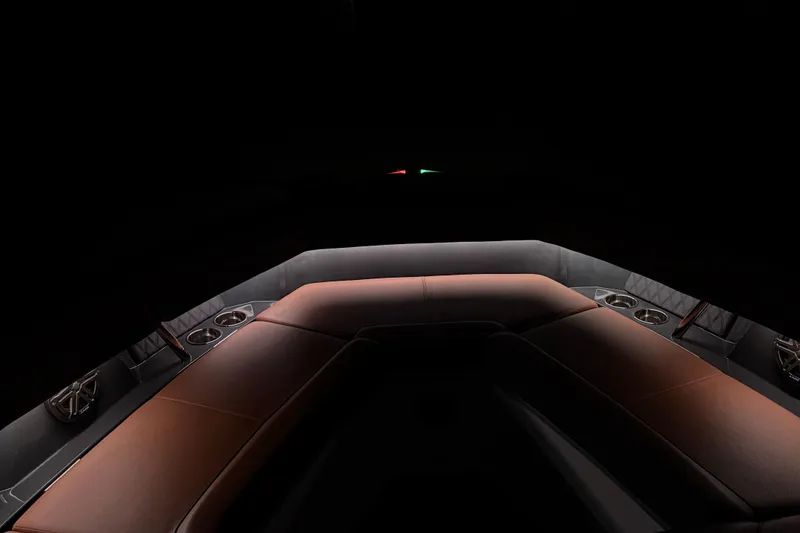 Slide: The Image of Luxurious interior of 2024 Cobalt R33 boat with elegant seating and cup holders. - 21