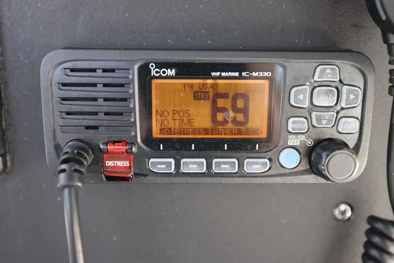 Slide: The Image of ICOM VHF Marine IC-M330 radio on a 2001 Contender 27 Open boat. - 27