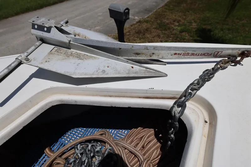 Slide: The Image of Anchor and chain on a 2001 Contender 27 Open boat. - 30