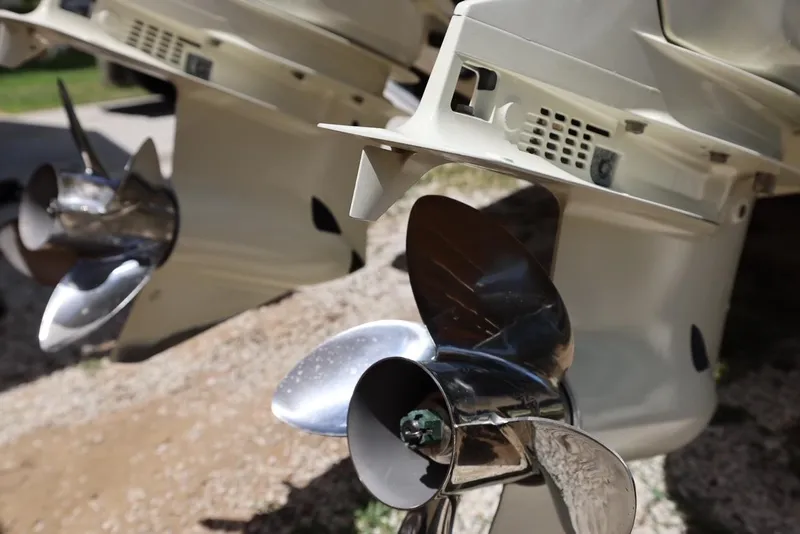 Slide: The Image of Close-up of propellers on a 2001 Contender 27 Open boat. - 9