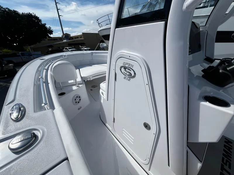 Slide: The Image of 2026 Sportsman Open 212 Center Console boat, featuring sleek design and modern amenities. - 18