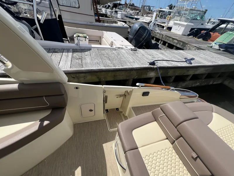 Slide: The Image of 2023 Chris-Craft Launch 28 GT interior, docked at marina. - 13