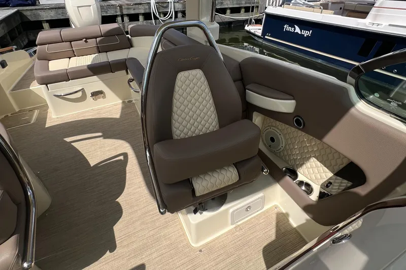Slide: The Image of Luxurious interior of 2023 Chris-Craft Launch 28 GT boat with elegant seating. - 22