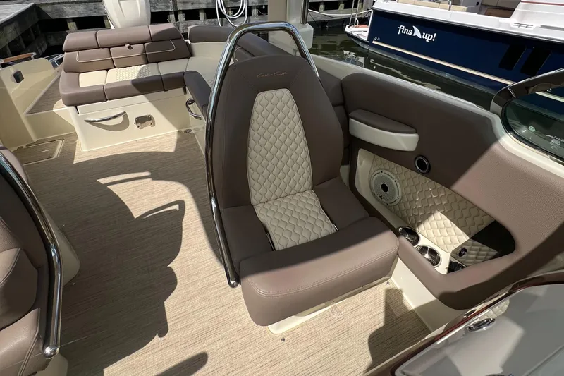 Slide: The Image of 2023 Chris-Craft Launch 28 GT interior with luxurious seating and elegant design. - 23