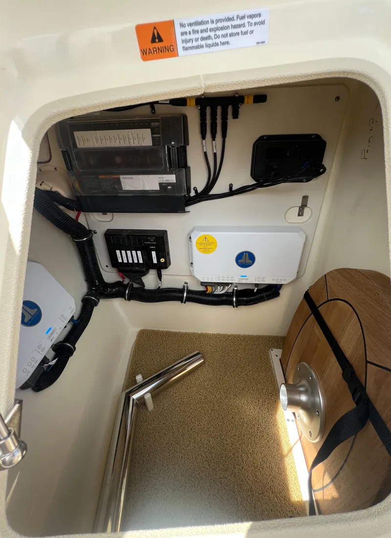 Slide: The Image of Interior view of 2023 Chris-Craft Launch 28 GT boat's electrical compartment. - 46