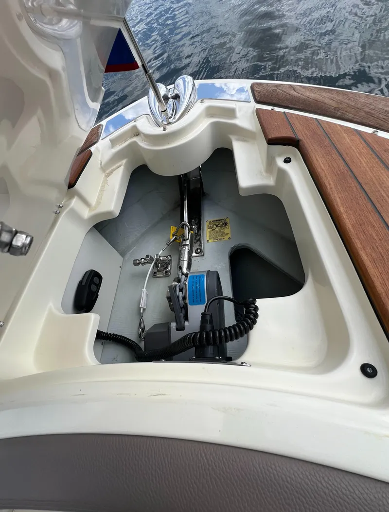 Slide: The Image of 2023 Chris-Craft Launch 28 GT anchor compartment with teak accents. - 48