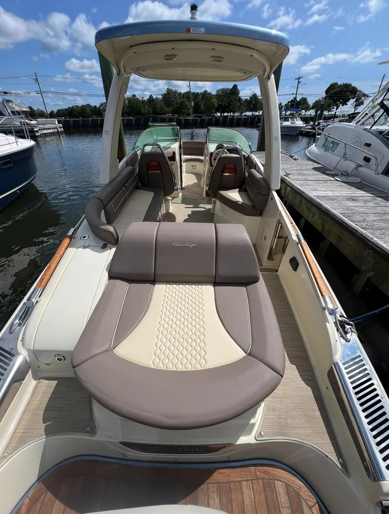 Slide: The Image of 2023 Chris-Craft Launch 28 GT luxury boat interior at marina. - 9