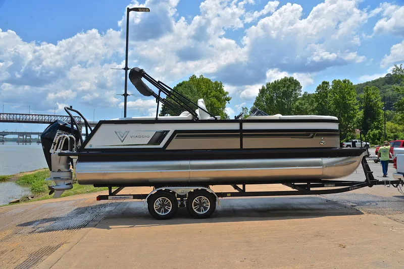 Slide: The Image of 2023 Viaggio Diamante 23 U Platinum pontoon boat on trailer by riverside. - 15