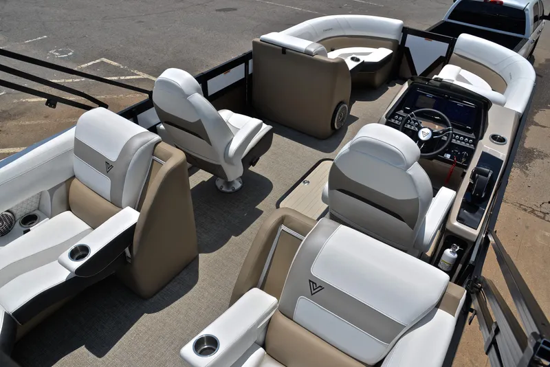 Slide: The Image of 2023 Viaggio Diamante 23 U Platinum boat interior with luxurious seating and modern dashboard. - 19