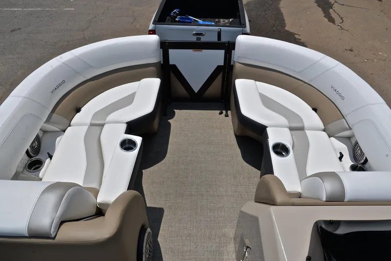 Slide: The Image of 2023 Viaggio Diamante 23 U Platinum boat interior with luxurious seating and cup holders. - 21