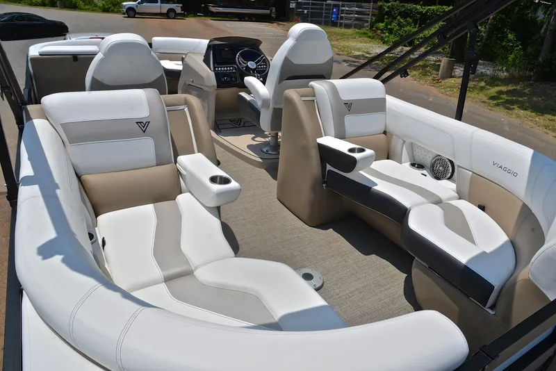 Slide: The Image of Luxurious 2023 Viaggio Diamante 23 U Platinum pontoon boat interior with plush seating. - 23