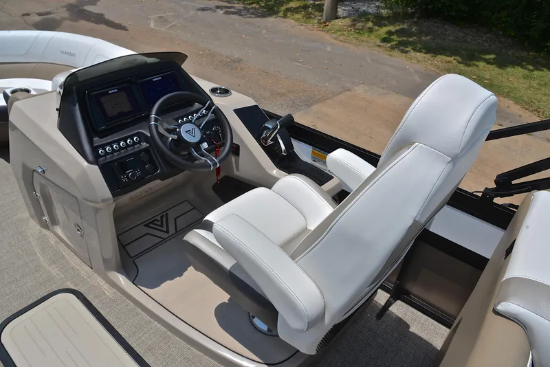 Slide: The Image of Luxurious 2023 Viaggio Diamante 23 U Platinum boat cockpit with modern steering and controls. - 24