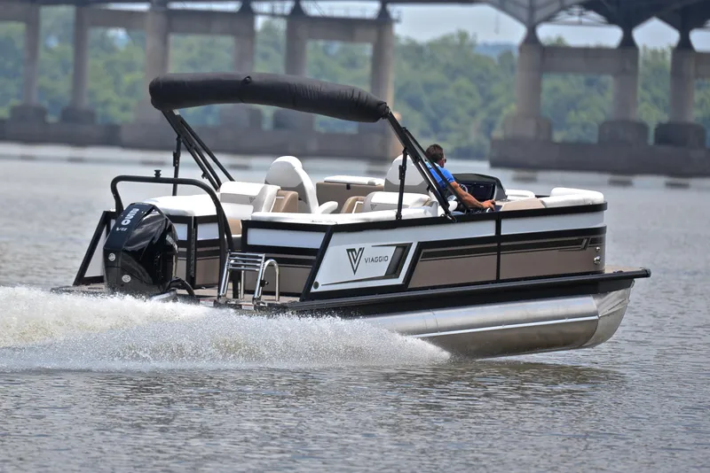Slide: The Image of 2023 Viaggio Diamante 23 U Platinum pontoon boat cruising on a river. - 5