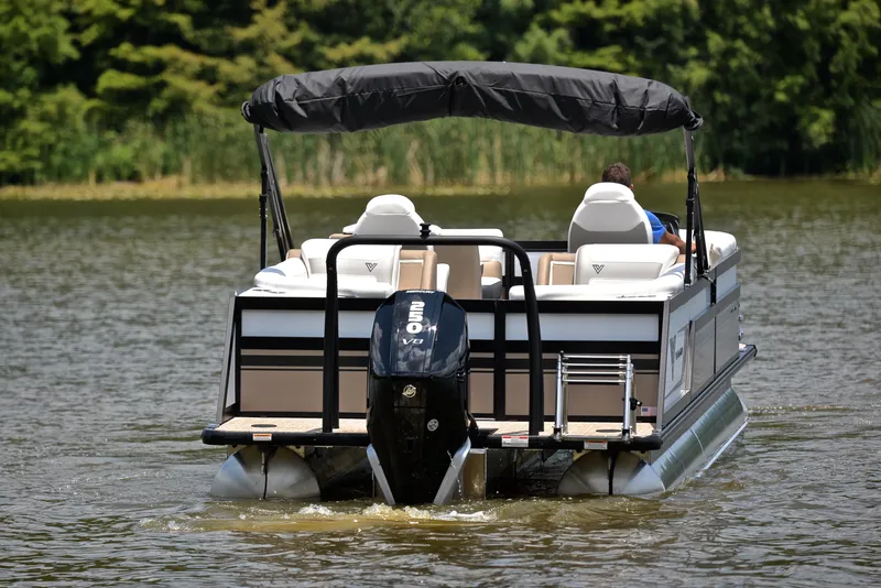 Slide: The Image of 2023 Viaggio Diamante 23 U Platinum pontoon boat on a lake. - 7