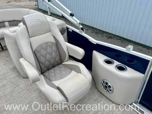 Slide: The Image of 2017 Bennington 23 RSR boat interior with plush seating and cup holders. - 18