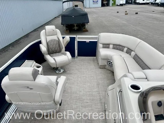 Slide: The Image of 2017 Bennington 23 RSR pontoon boat interior with plush seating and modern design. - 20