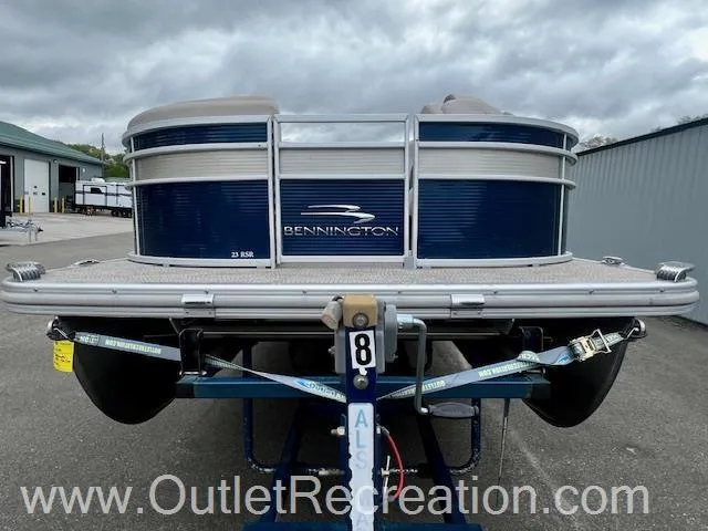 Slide: The Image of 2017 Bennington 23 RSR pontoon boat on trailer, displayed at OutletRecreation.com. - 3